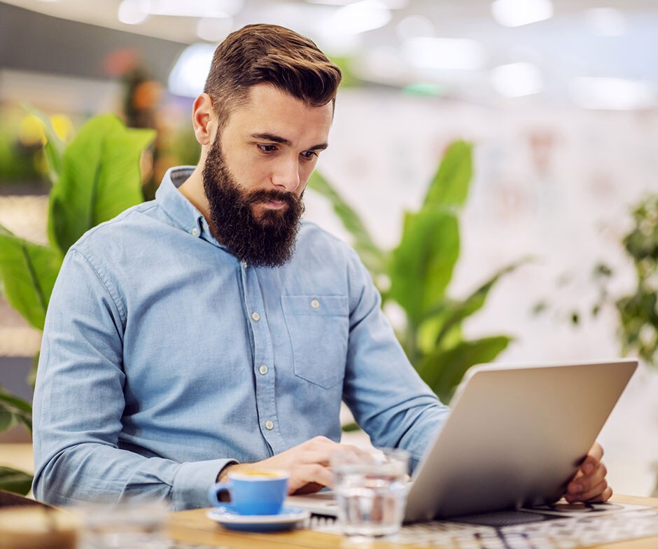 man using laptop