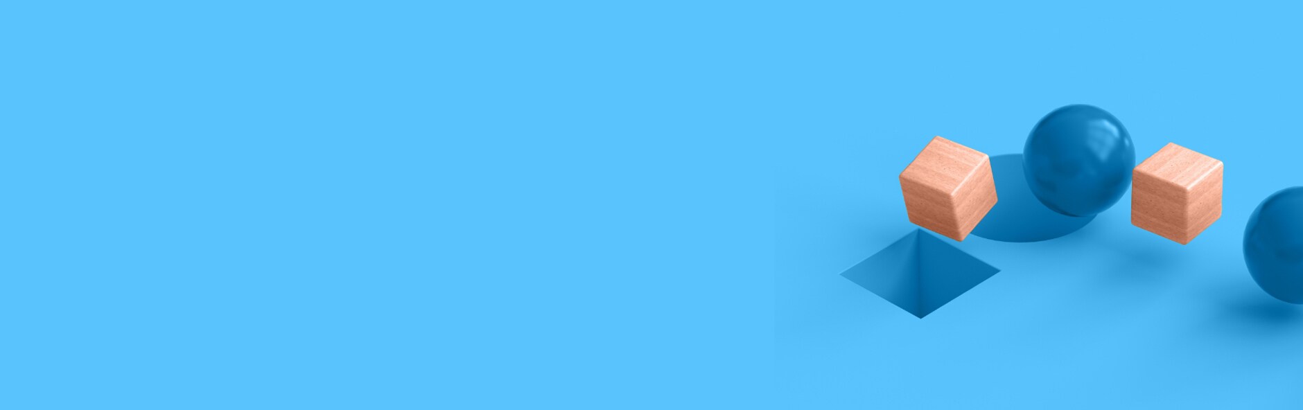 wooden cubes and blue circles on a blue background