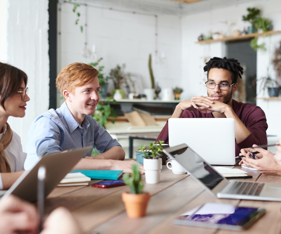 Group of people working on a computer