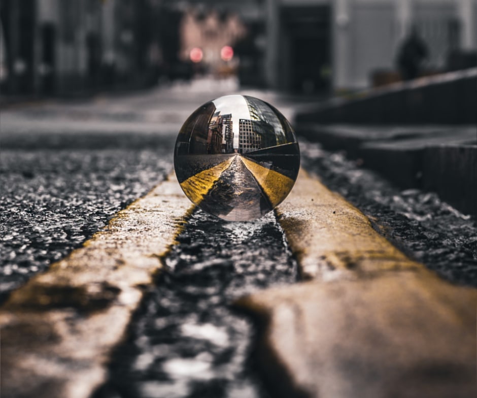Hero Image of a marble in the street