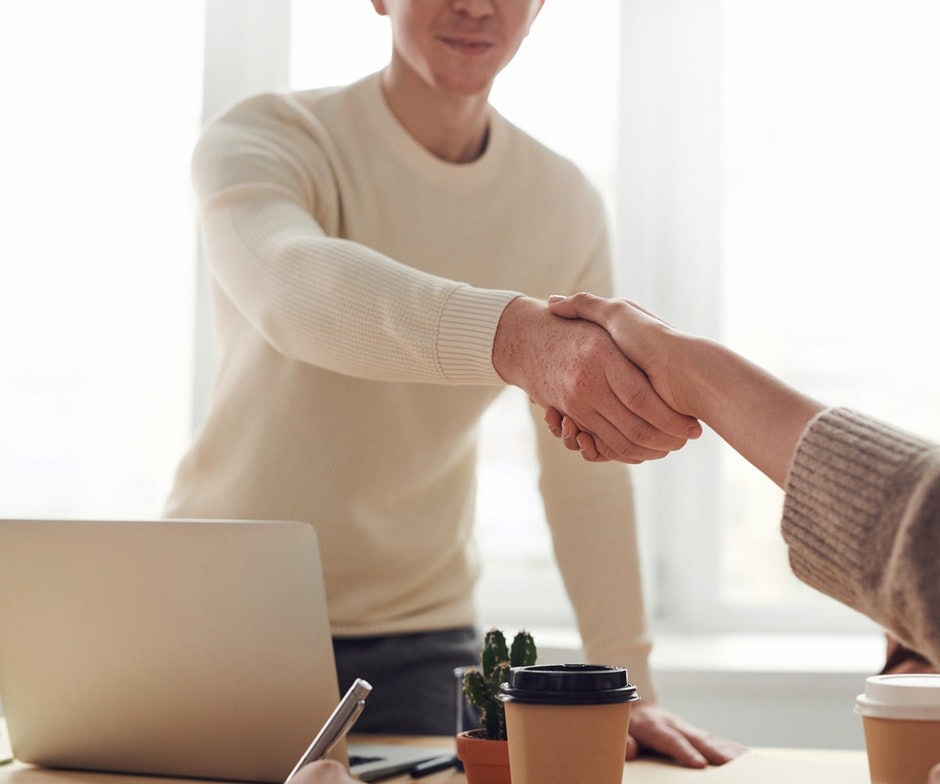 Two people shaking hands