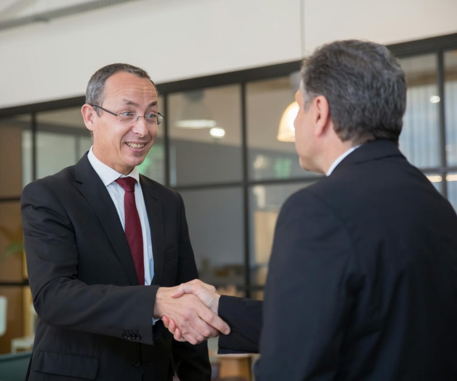 two professionals shaking hands