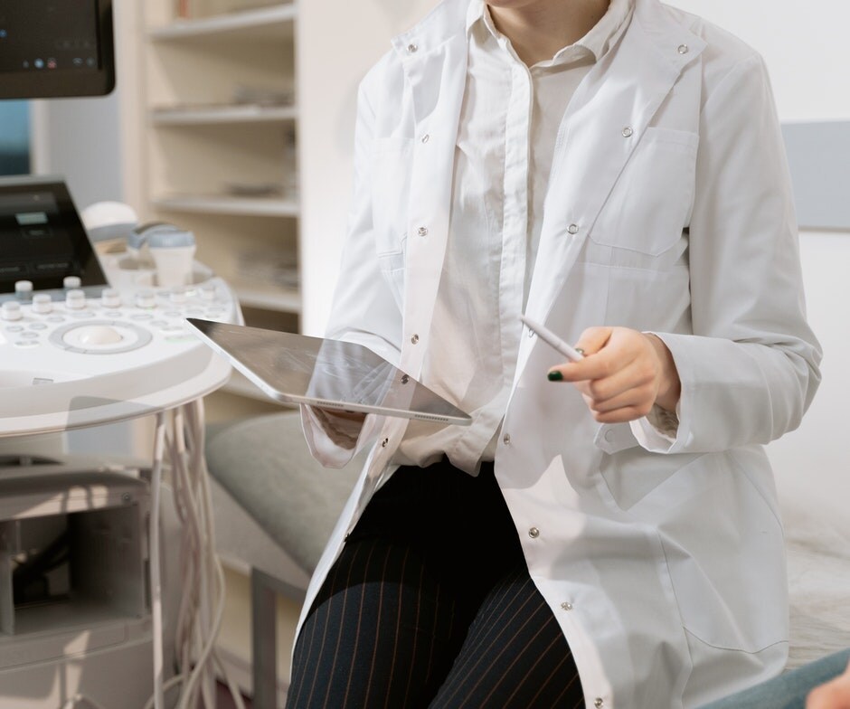 medical worker looking in tablet