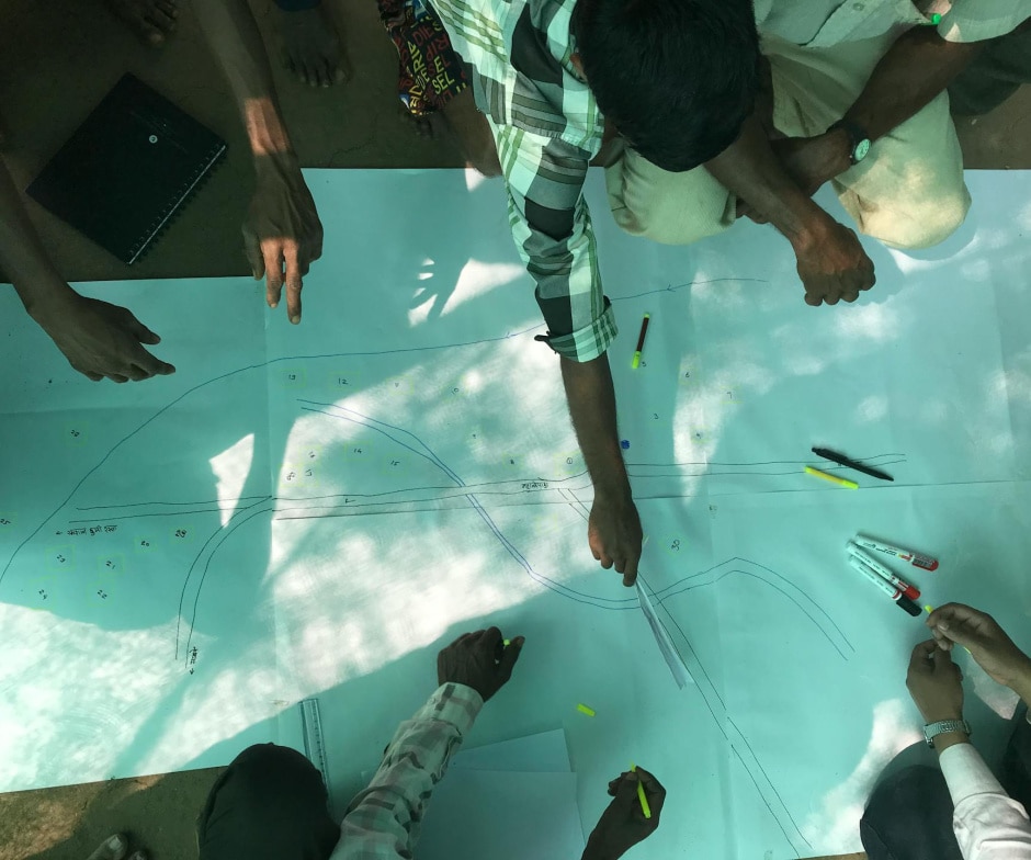 team drawing out a plan