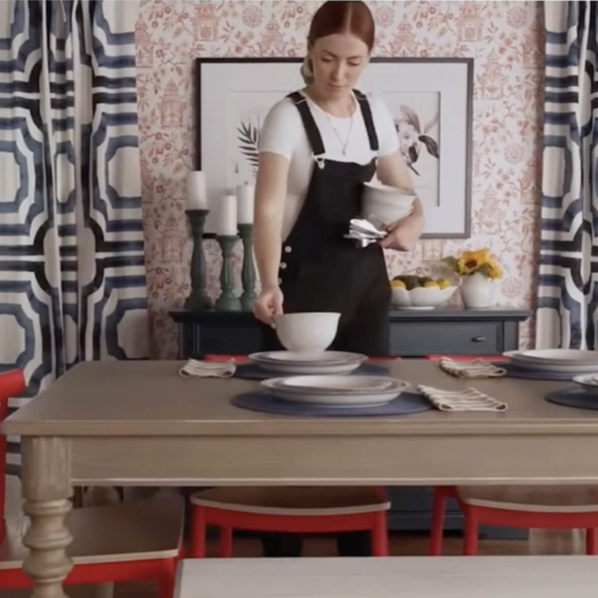 person wearing apron and working the table