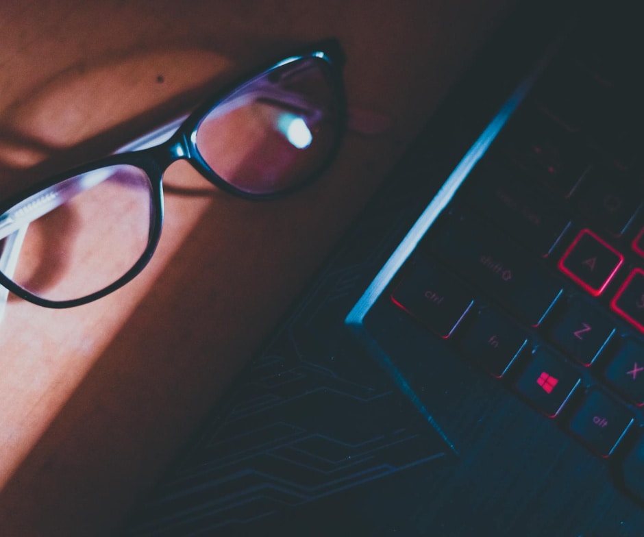glasses and a keyboard