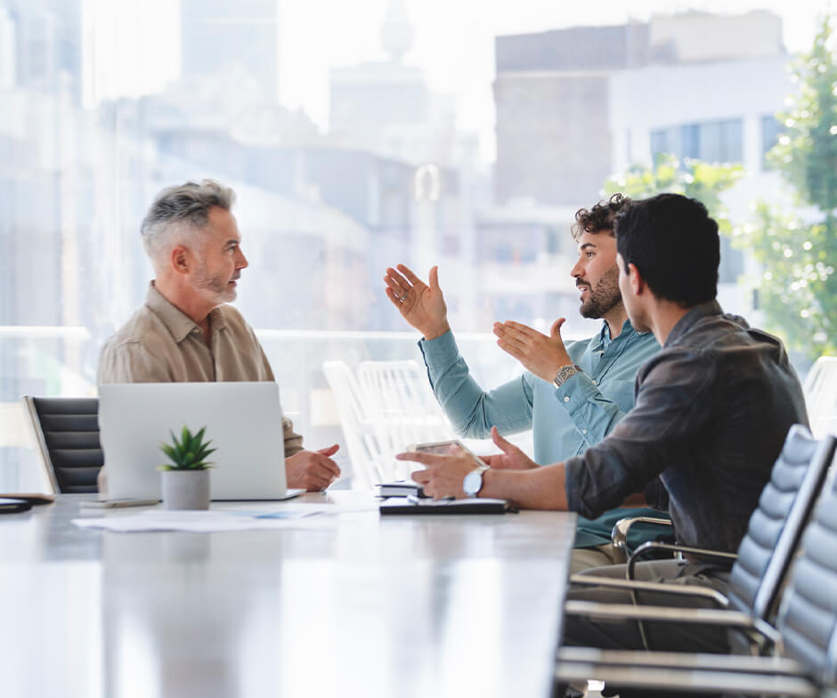 Professionals talking in conference room