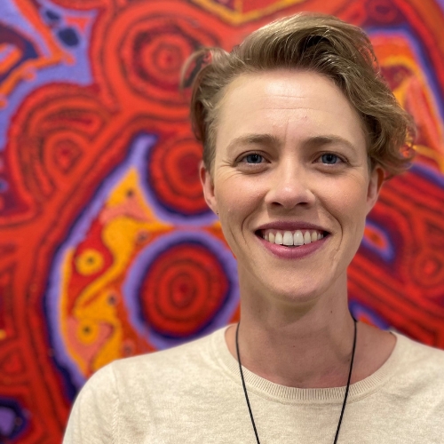 A smiling headshot of Dr Katharine Brown