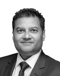 Fabian Ross image featuring a well-dressed in a suit.