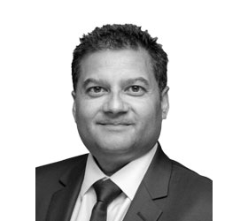 Fabian Ross image featuring a well-dressed in a suit.