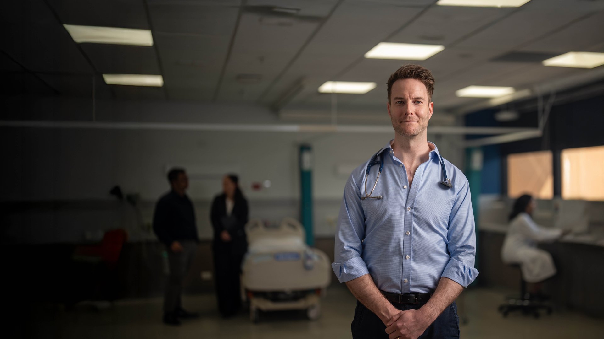 Dr Geoff Lester Standing in a hospital room