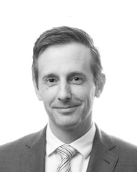 Matthew Best image featuring a well-dressed in a suit.