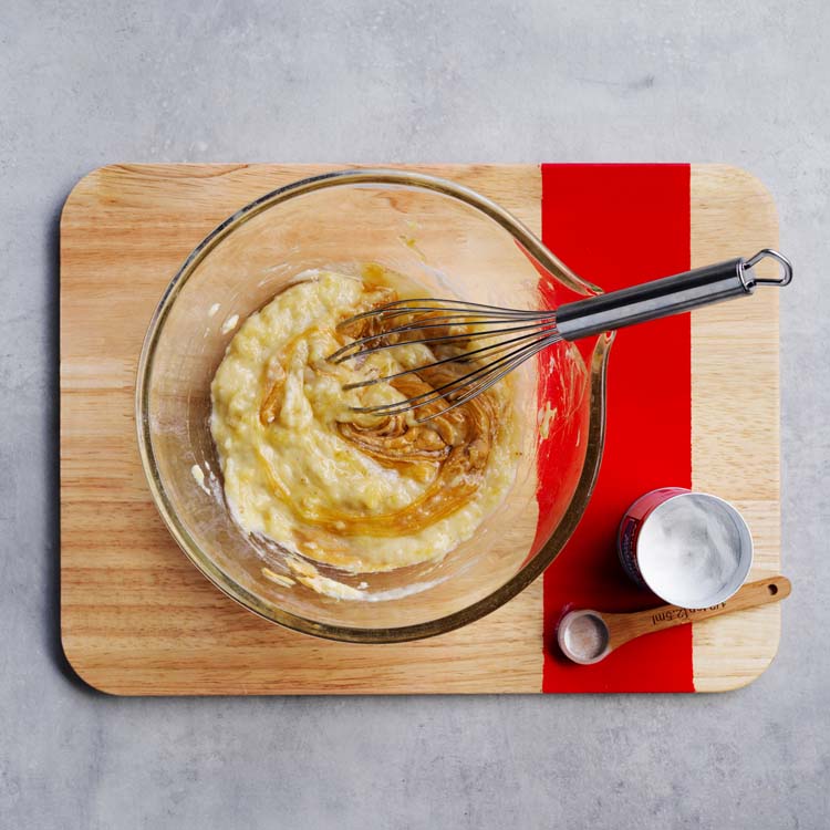 Banana, nut spread, honey and baking powder whisked in a large bowl