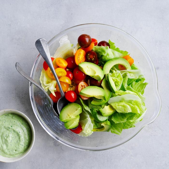 Serving chicken schnitzel salad