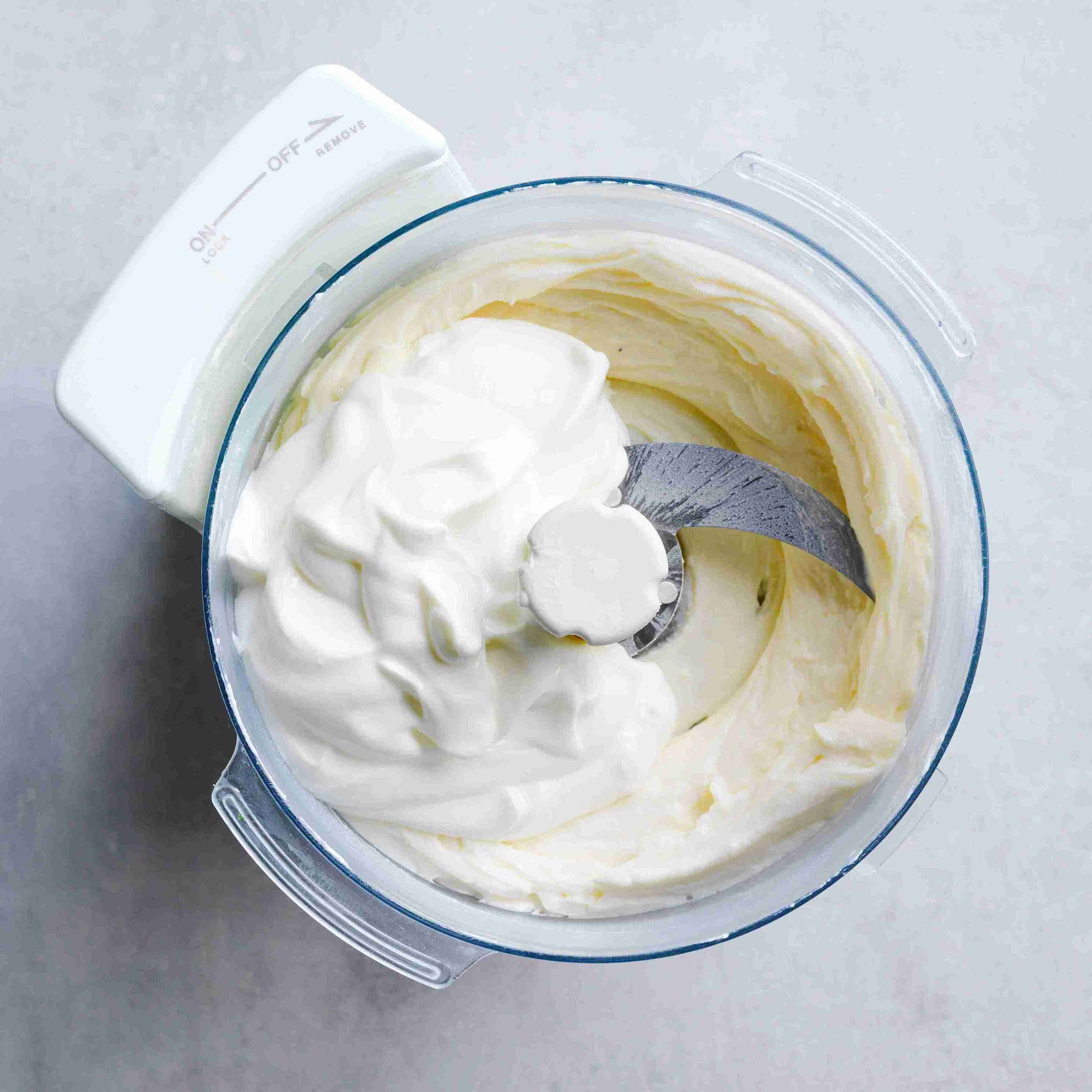 smooth ricotta mixture with vanilla, icing sugar, and yoghurt in a food processor