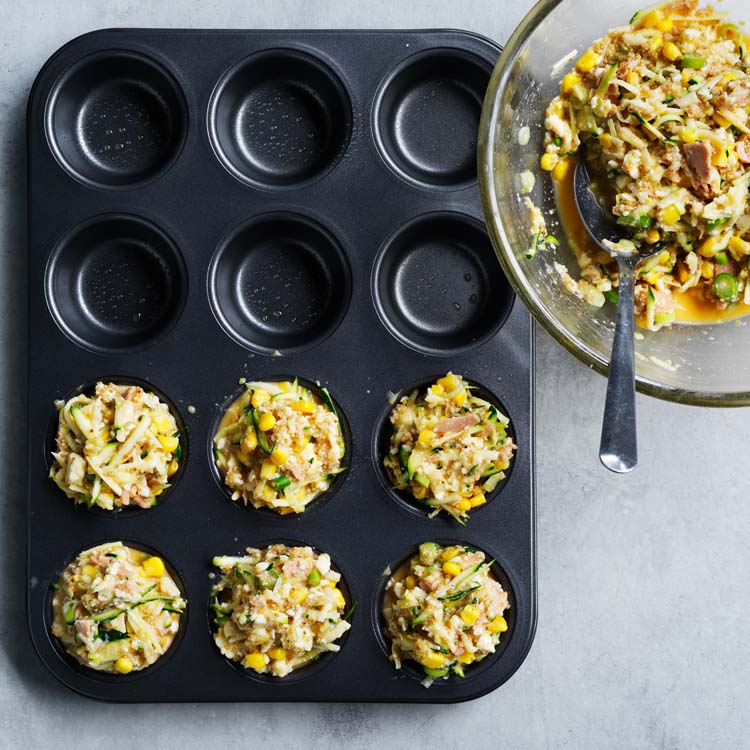 Mixture spooned into a muffin tray