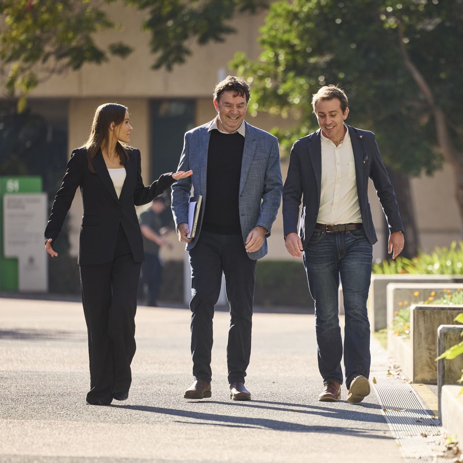 Three people walking