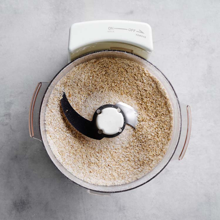 Rolled oats being processed into a fine powder
