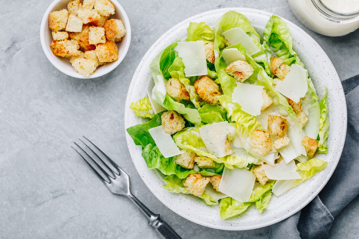 Caesar salad with croutons on a plate