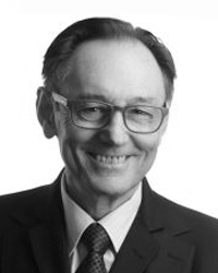 Mario D’Orazio wearing glasses, smiling