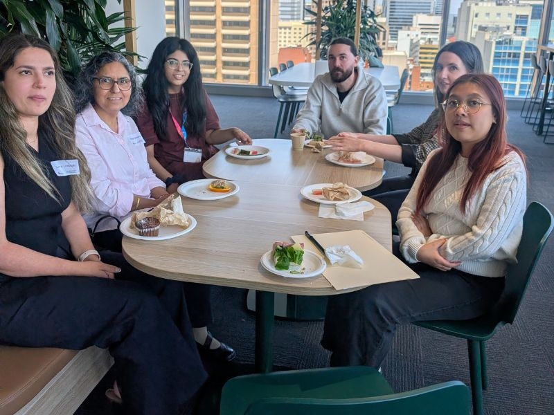 A group of researchers having lunch at the SA CVRN Showcase