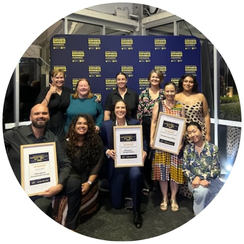Group posing together at an awards event