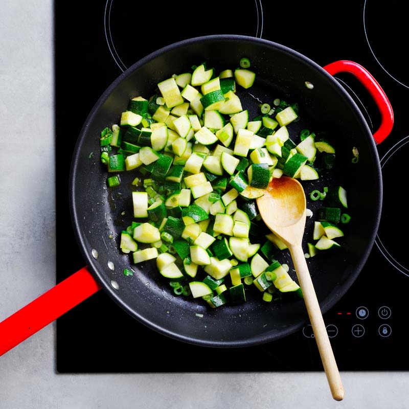 Heat oil and cook zucchini and shallots