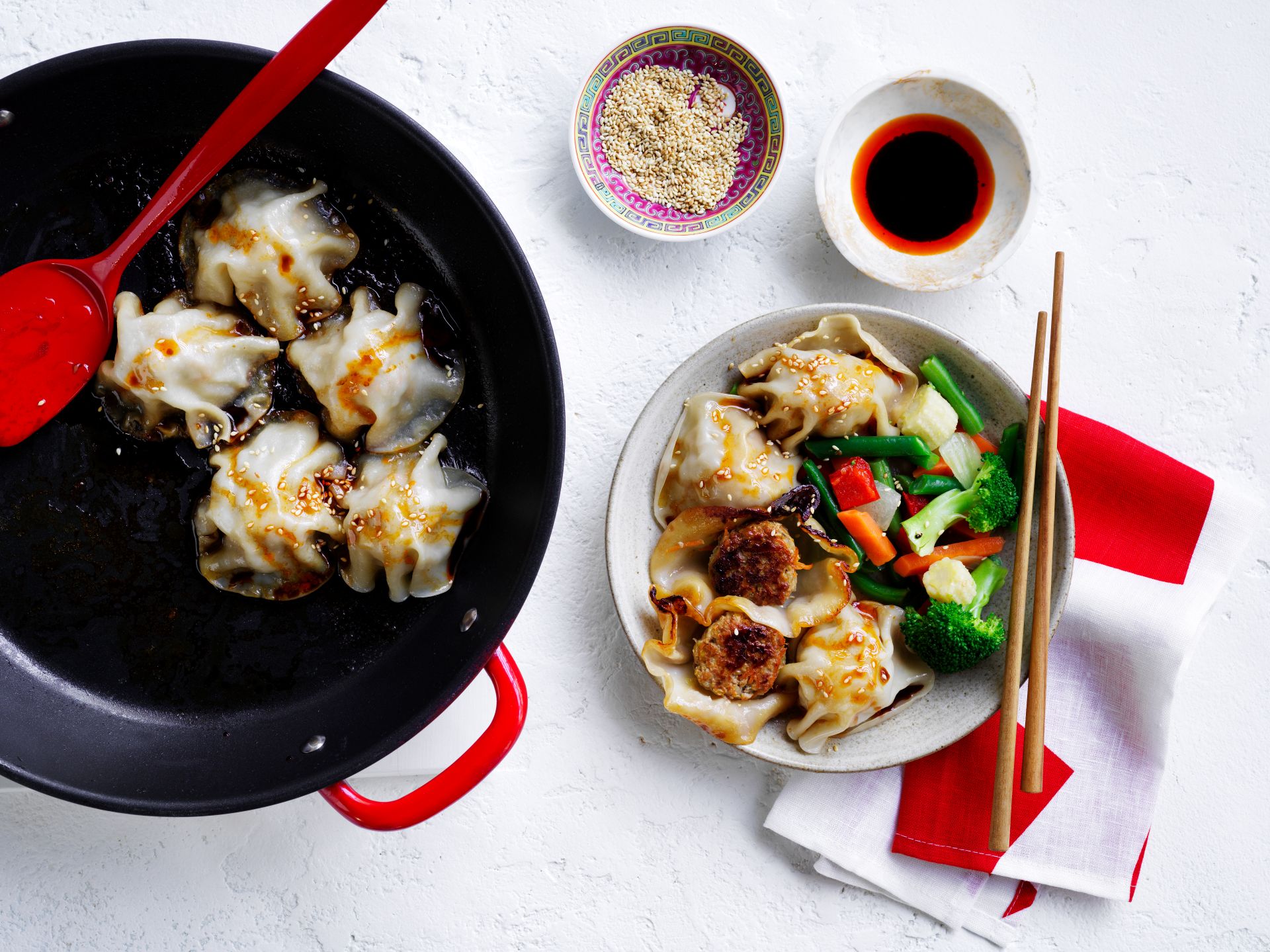 Crispy no-fold pork dumplings served with mixed vegetables and dipping sauce.