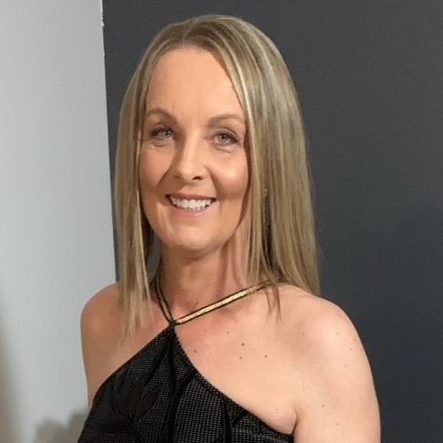 Cindy smiling, sharing heart stories of her journey with STEMI and heart spasms