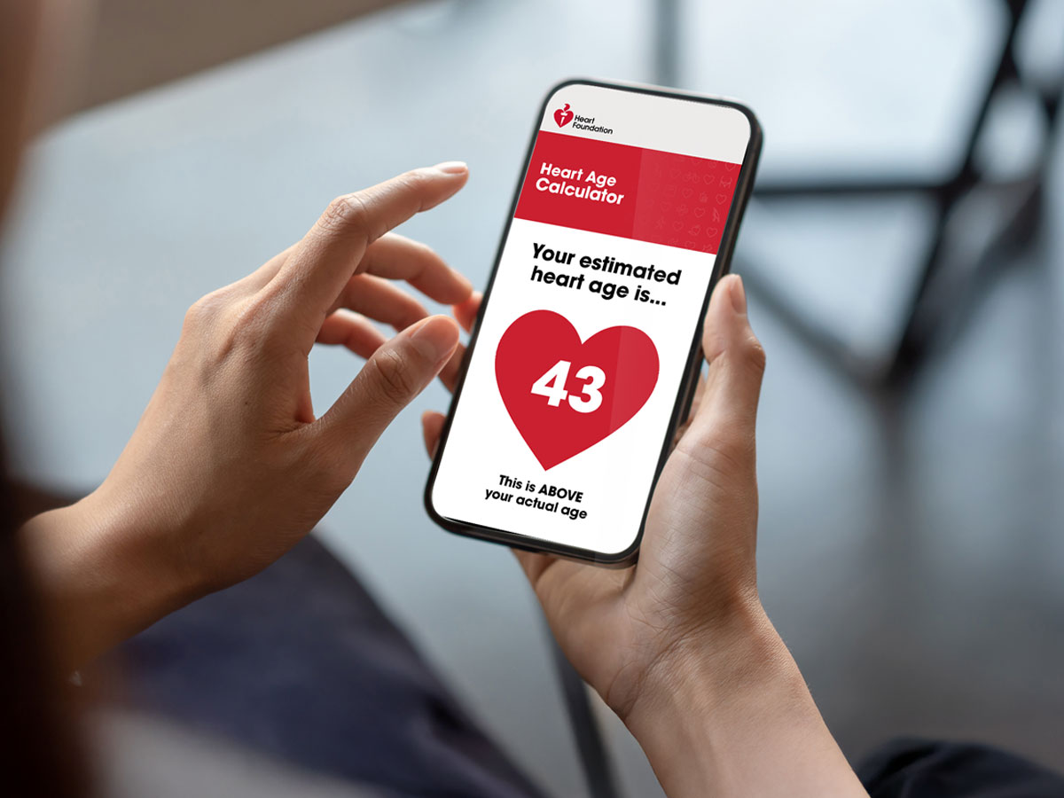 A person using the Heart Age Calculator on their phone