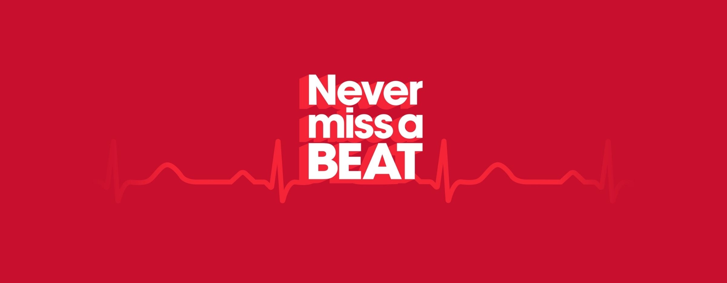 Animation with a heartline beating through the words 'Never miss a BEAT'