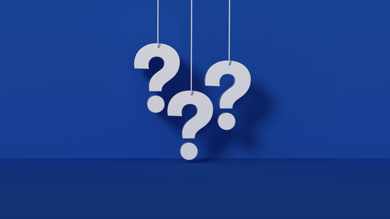 Question marks on blue background