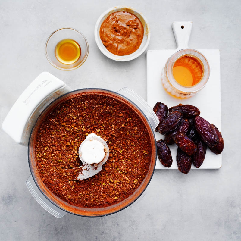 Chopping pistachios and processing nuts with cocoa