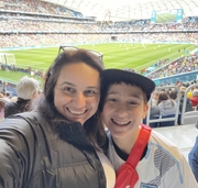 Anastastia and Felix Georgiou, a mother and son smiling in a selfie at the soccer