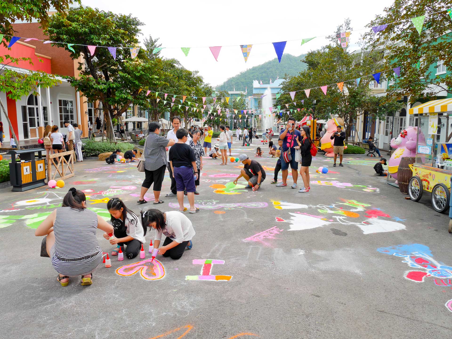 Community at a street event creating colourful atmosphere