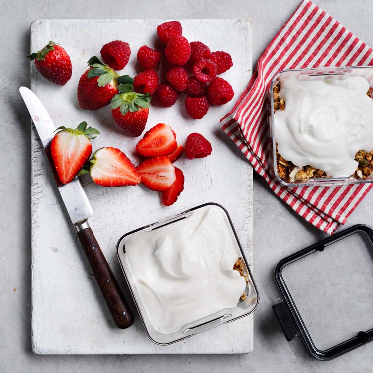 Berries added on top of yoghurt and granola