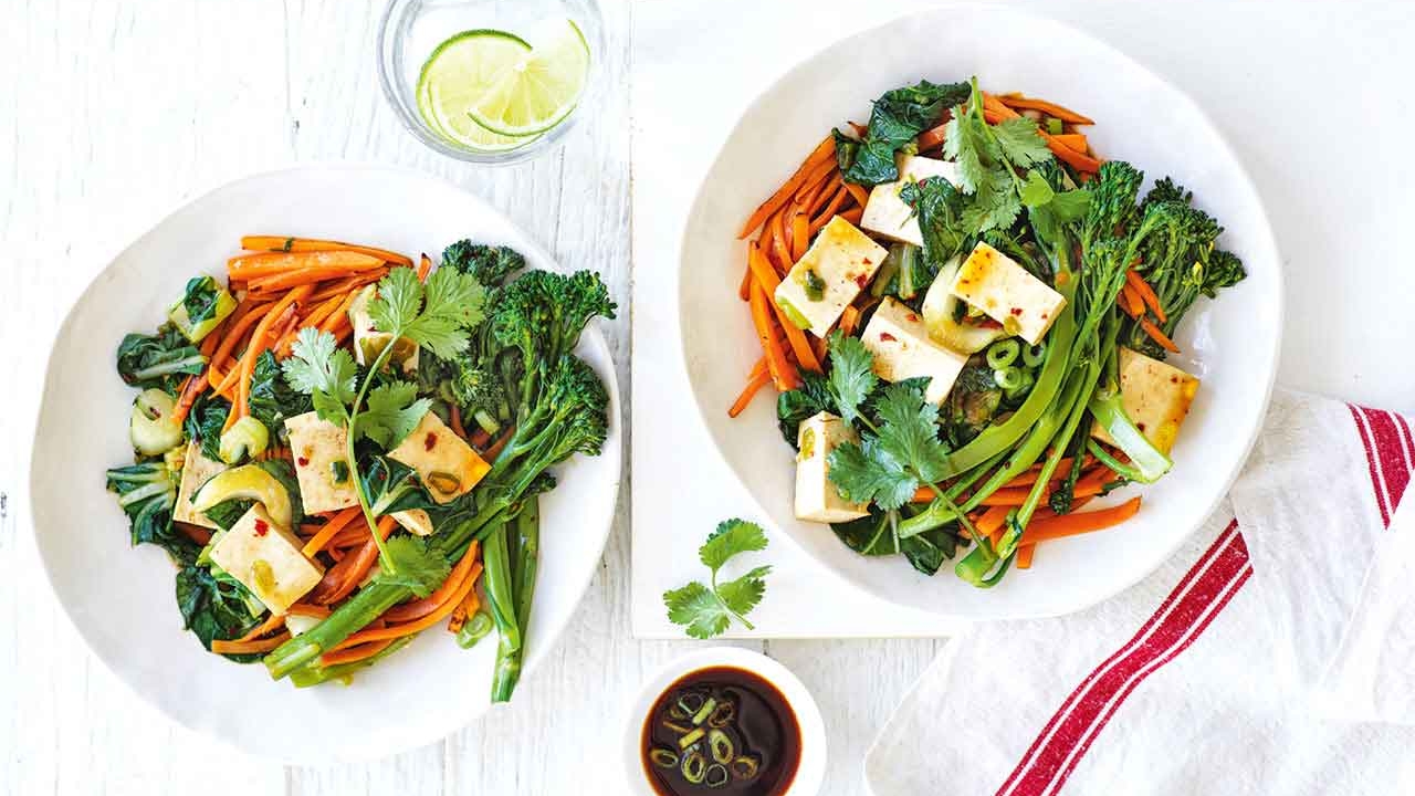 Two plates of Chilli tofu and sweet potato stir-fry