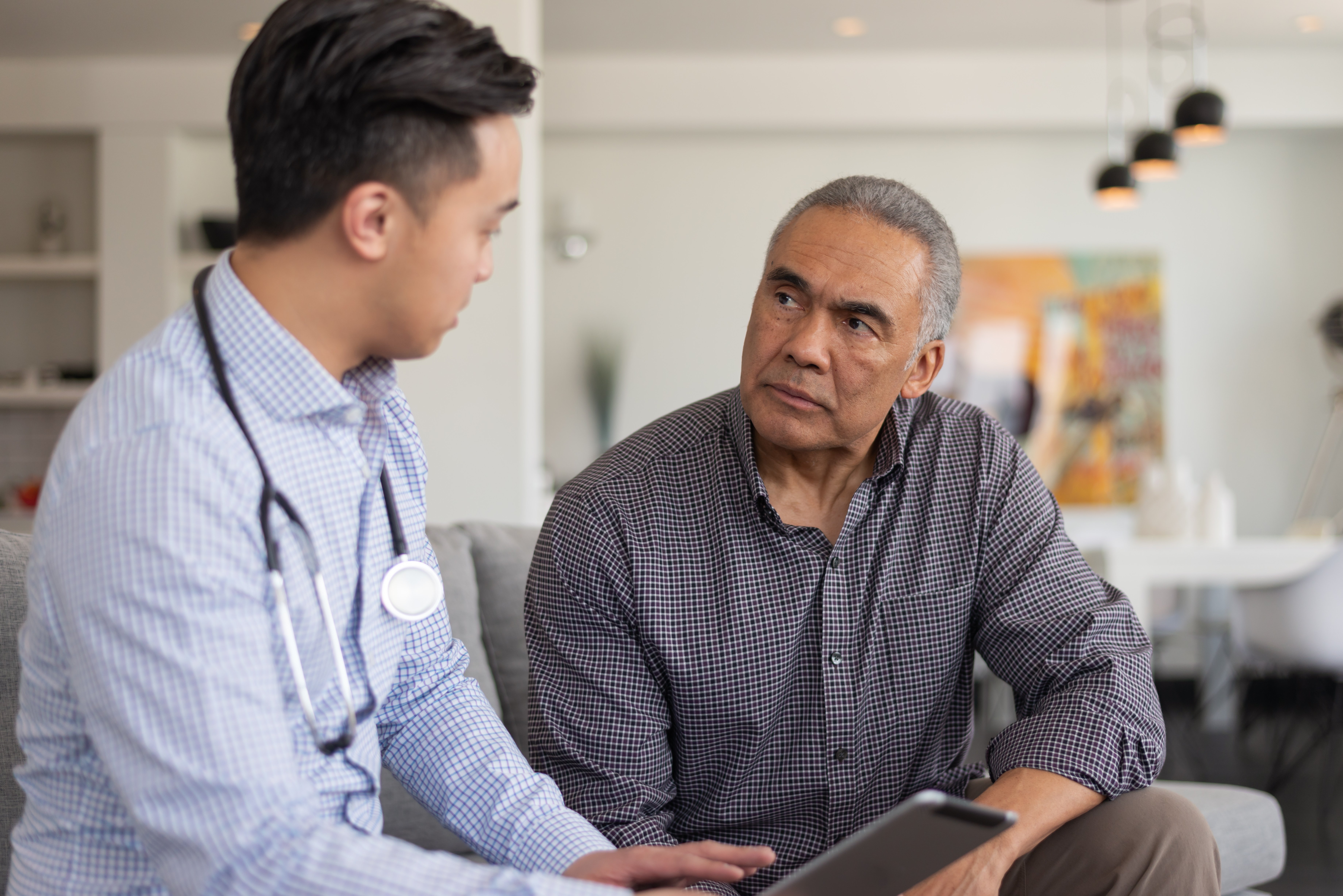 A patient and doctor conversing