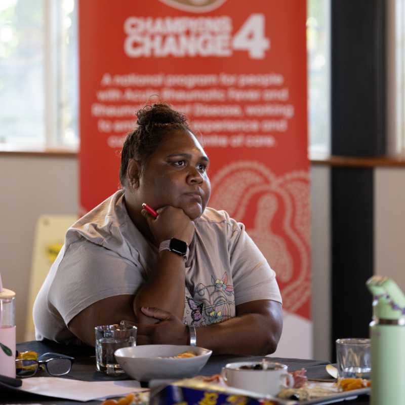 A First Nations woman listening in at a Champions4Change workshop