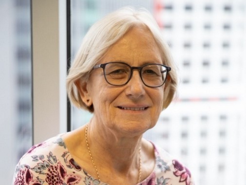 Susan Campbell indoors near a window