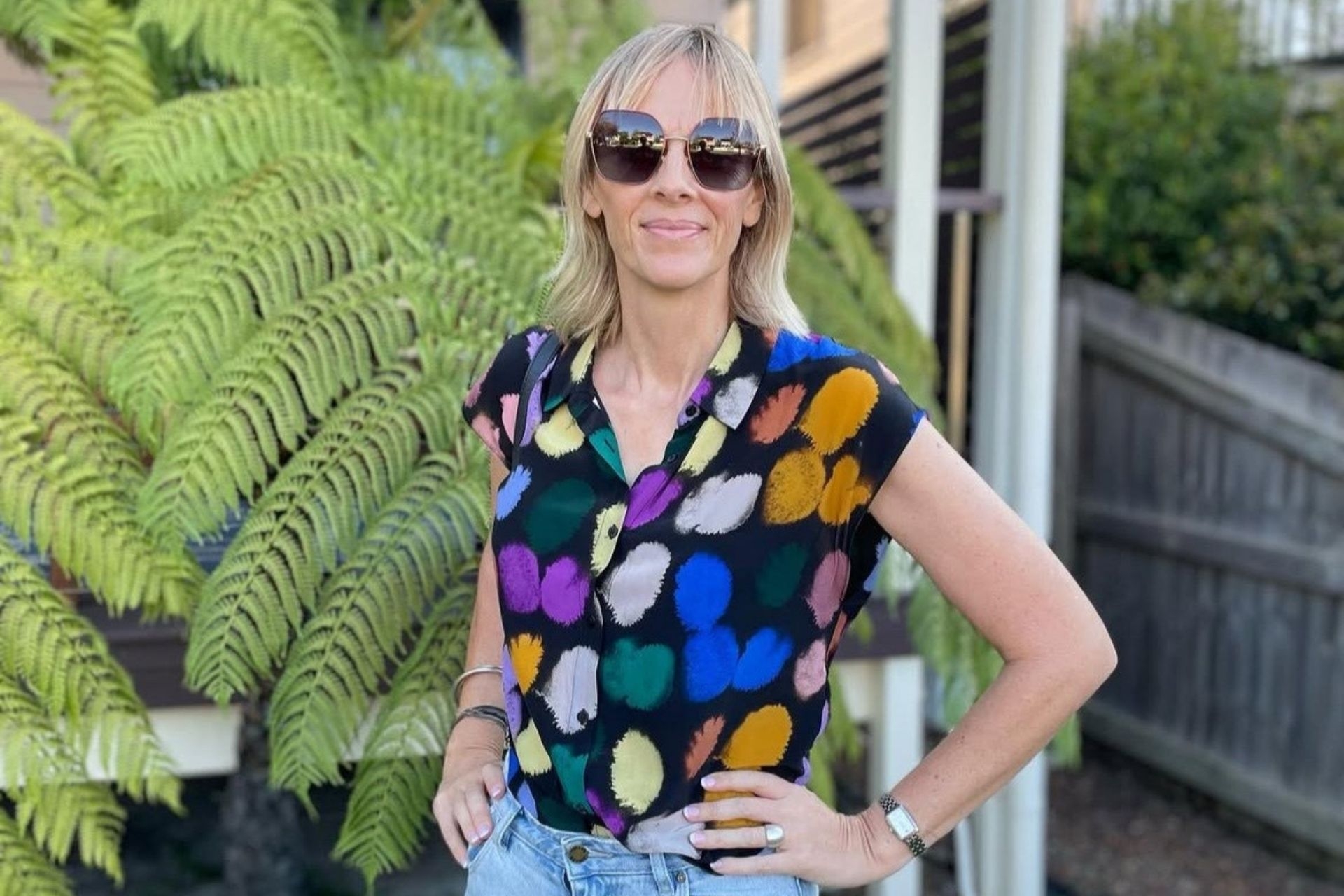 Felicity Tucker, a smiling blonde woman in a vibrant shirt