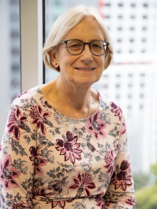 Susan Campbell indoors near a window