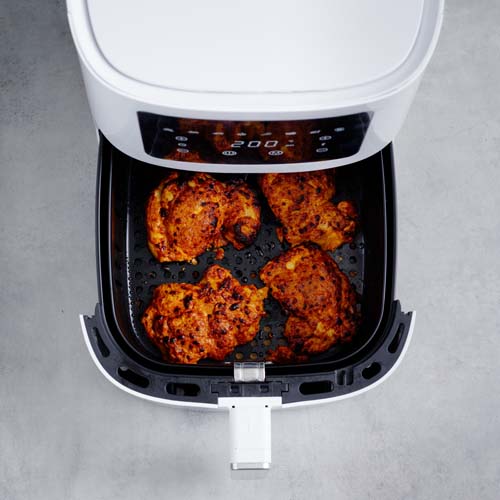 Air frying chicken in the basket