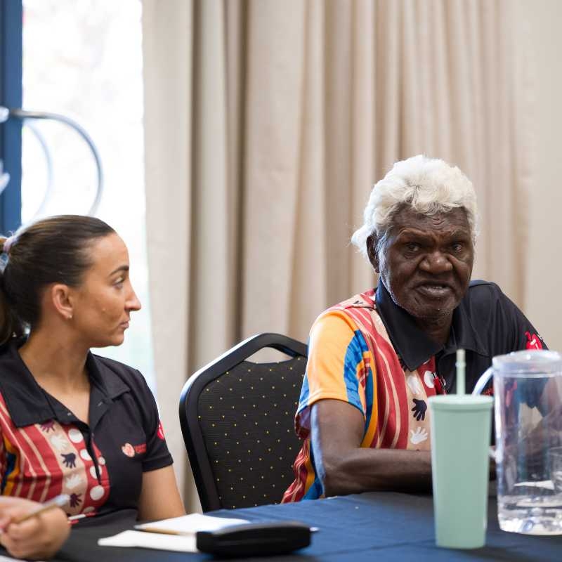 A Heart Foundation staff member and a Champion4Change sitting together at a workshop