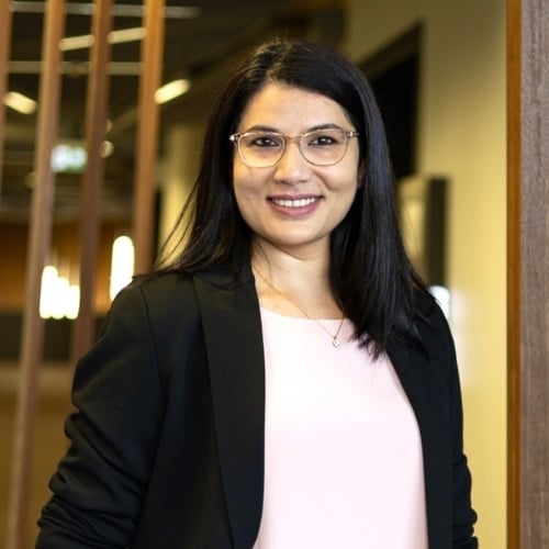 A smiling headshot of Dr Susan Paudel
