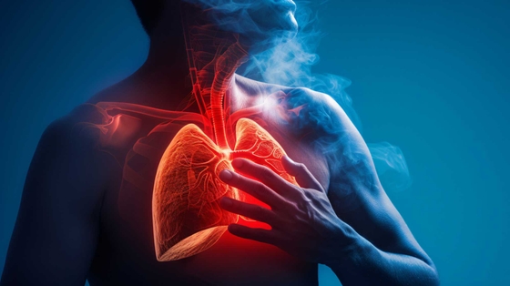 Human body showing lungs and throat internally glowing red, surrounded by smoke