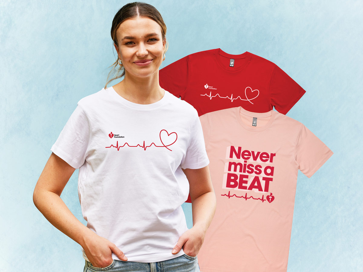 A young woman wearing the Heart Week Never miss a BEAT merchandise