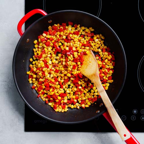 Cooking corn and capsicum