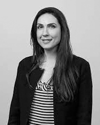 A monochrome image of Ms Isabelle Demir.