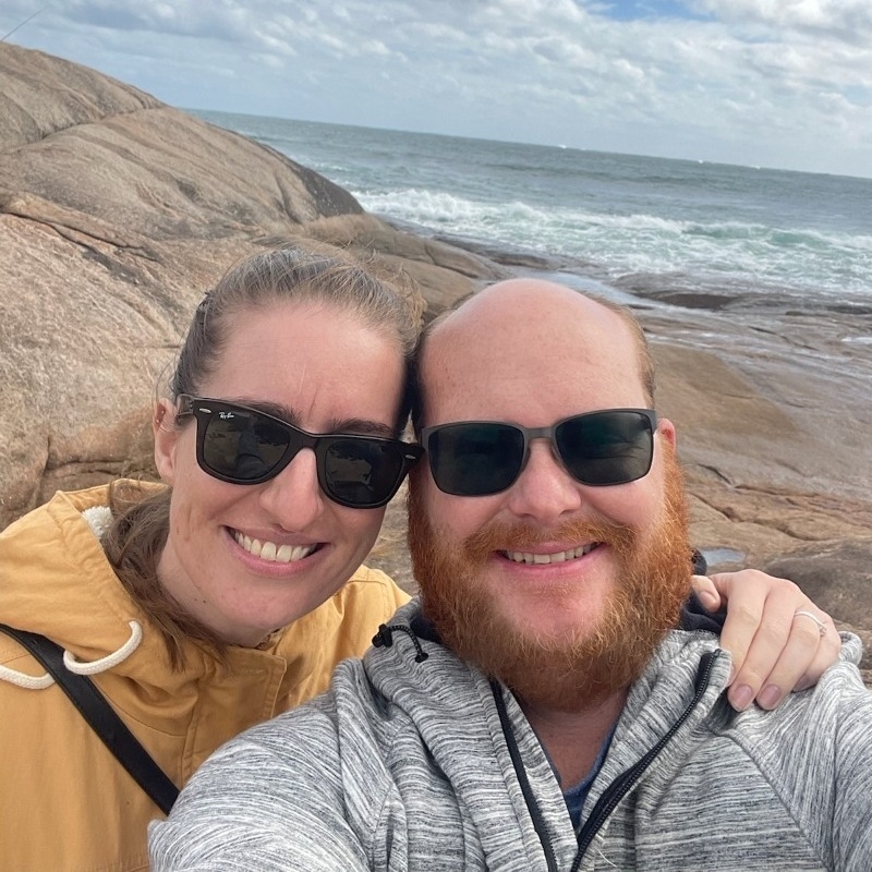 Darren and his partner at the beach